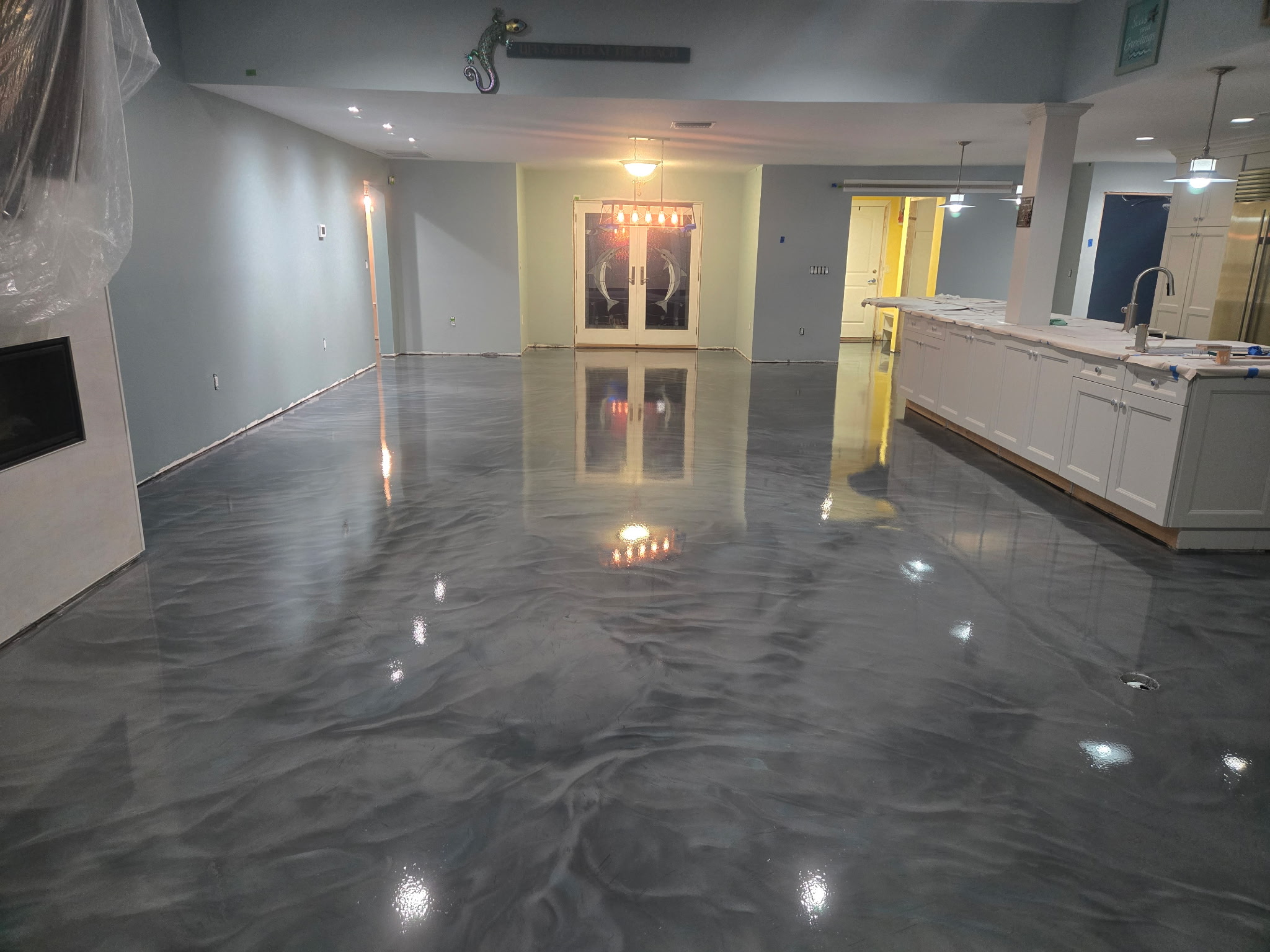 Metallic epoxy living room floor project